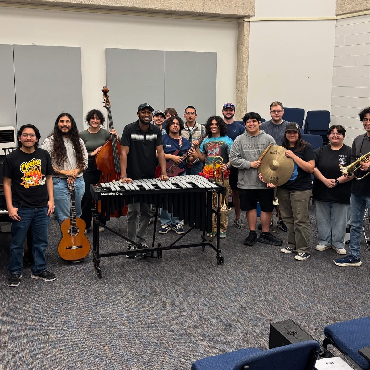 Beyond the Note students and instructor with instruments in the studio