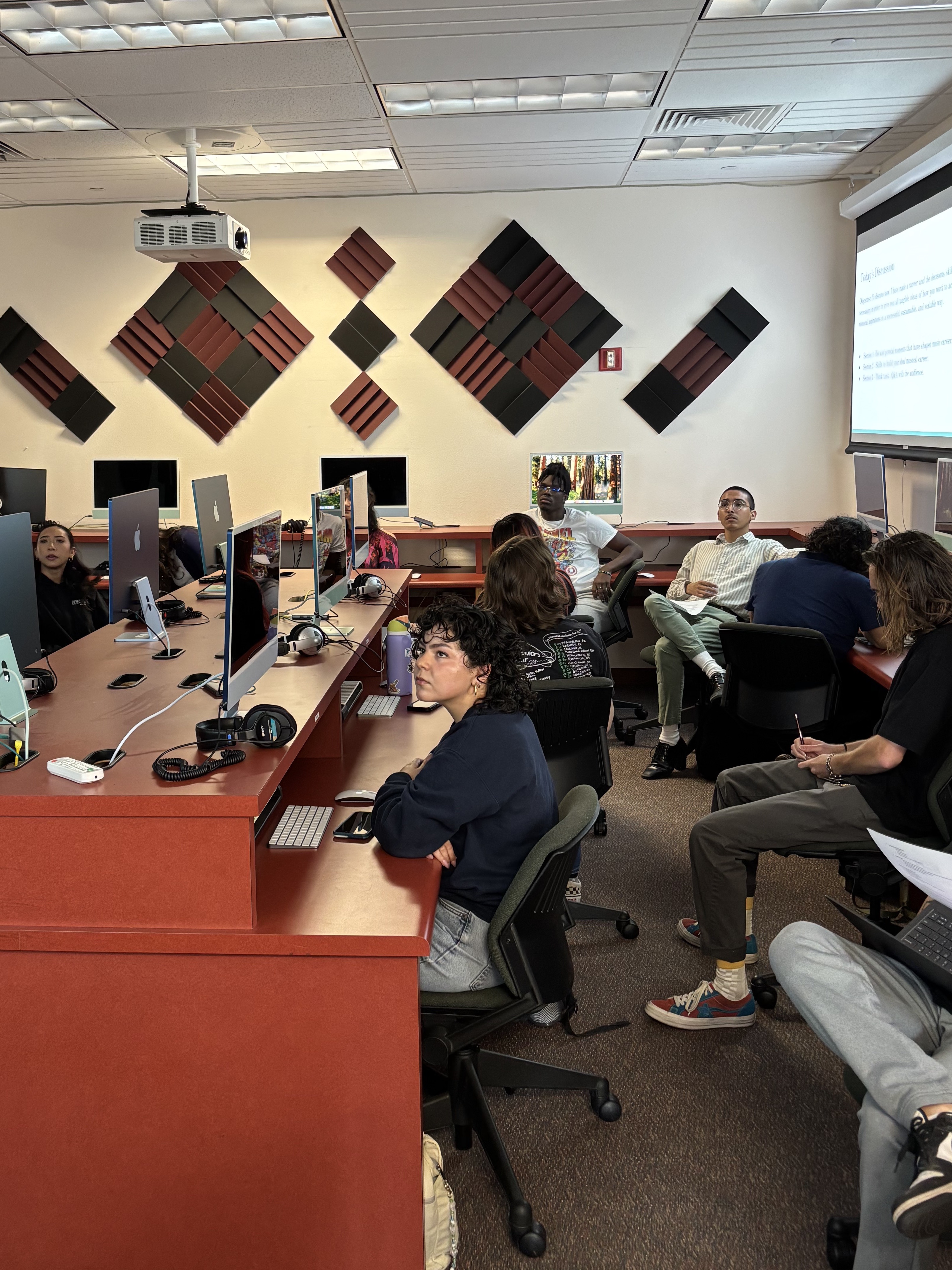 Students in a group music production class at Beyond the Note